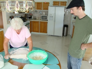 Stephen learning the art of dumpling making from Aunt Joan